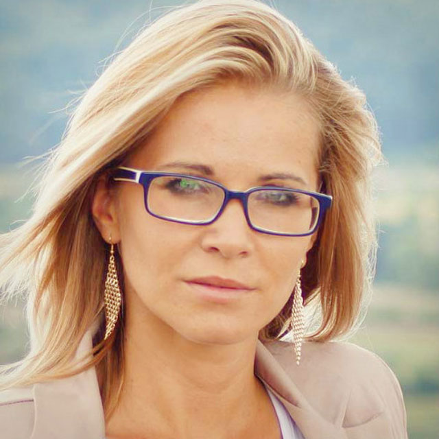 Sexy blond woman with slim glasses