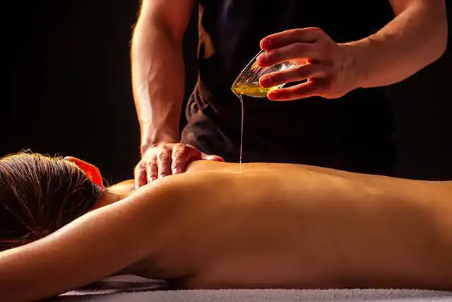 Image of woman relaxing while having a massage